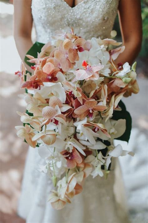 Destination weddings are a bridal trend that doesn't appear to be letting up anytime soon. Tropical Garden Wedding | Orchid bouquet wedding ...