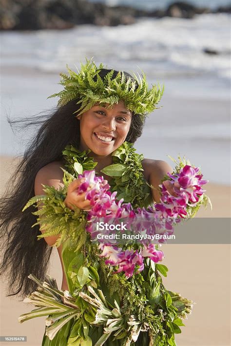 Hawaiian Hula Girl Offers A Flower Lei Stock Photo Download Image Now