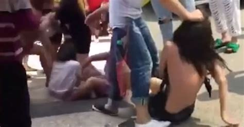 Angry Wives Strip Mistress In Public After She Was Caught Red Handed With One Of Their