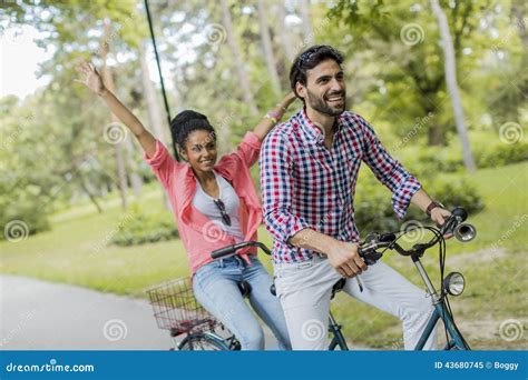 Young Couple Riding On The Tandem Bicycle Stock Image Image Of Action