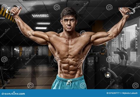 Muscular Man Working Out In Gym Doing Exercises Strong Male Naked