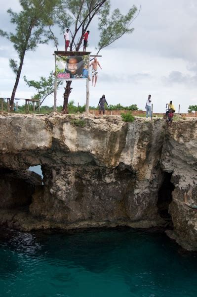 cliff diving at rick s cafe in negril jamaica brendan van son photography