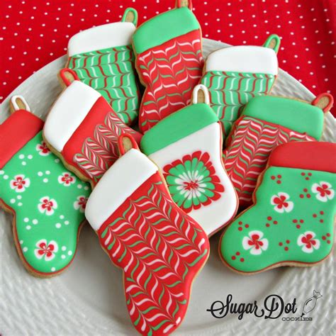 Some fun and easy ideas to decorate christmas sugar cookies using royal icing! Christmas Trees....sprinkles, decorated, snow covered. A ...