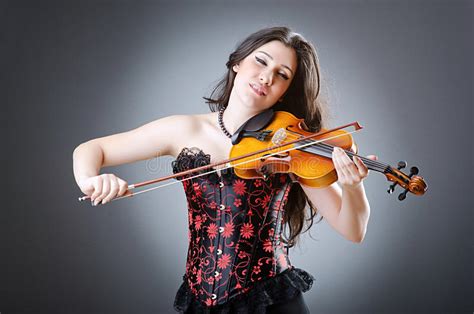 This beginner irish fiddle tutorial, with niamh dunne of irish band beoga, shows you how to play the fiddle, step by step. Female Violin Player On The Background Stock Images ...