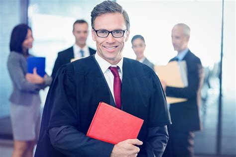 Stock Photo Portrait Of Lawyer Holding Law Book In Office 532113529
