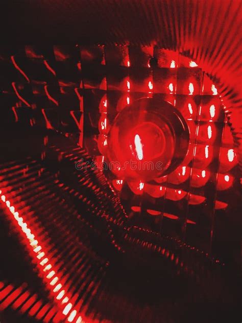 Abstract Pattern Inside Red Light Bulb And Reflecting Mirror Stock