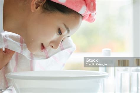 Young Asian Woman Washing Her Face Stock Photo Download Image Now