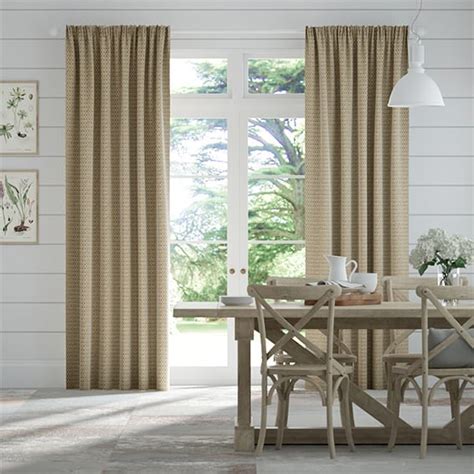 A clean, contemporary white palette in this traditional spanish style. Berber Basket Beige Curtains | Blinds Online™