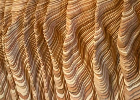 Hundreds Of Pieces Of Stacked Wood Form Beautifully Organic Sculptures