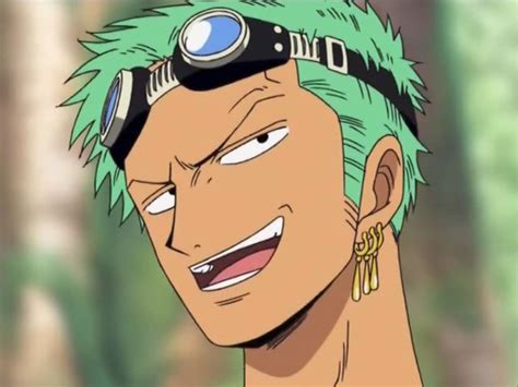 An Anime Character With Green Hair And Piercings On His Head Is Looking