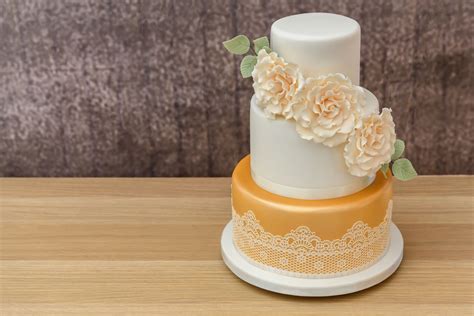 Place a dollop on top of the cake. How to Bake and Decorate a 3-Tier Wedding Cake