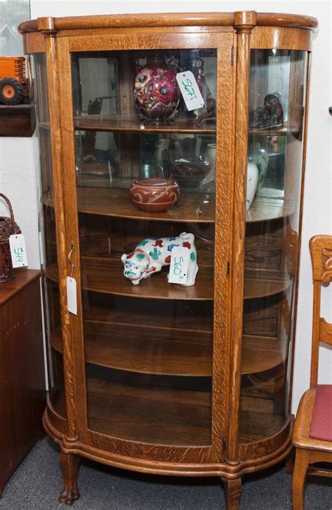 Get inspired with our curated ideas for china cabinets & hutches and find the perfect item for every room in your home. Oak curio display cabinet with single glass door and convex