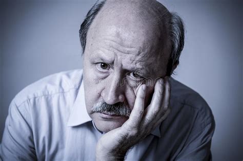 Head Portrait Of Senior Mature Old Man On His 60s Looking Sad An Stock
