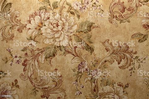 Closeup Of Beige Vintage Wallpaper With Floral Pattern Stock Photo