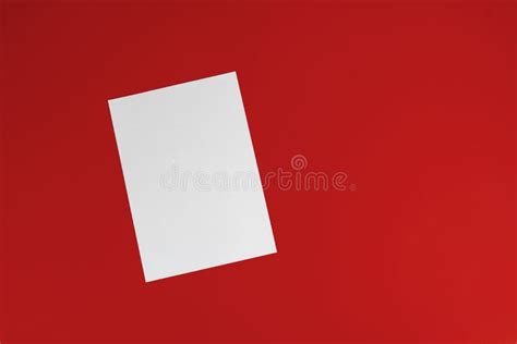 A Blank Empty White Paper Sheet Of A4 Format On The Table In Office