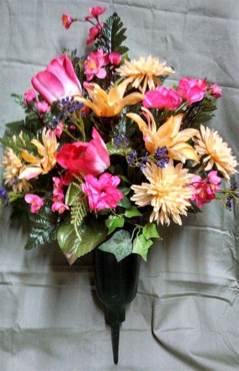 The mixed bush floral arrangement isn't just known for being the best choice for grave and cemetery flowers but they also look really beautiful in home lawns and gardens. Pink Cemetary vase www.picketfenceflowersandgifts.com can ...