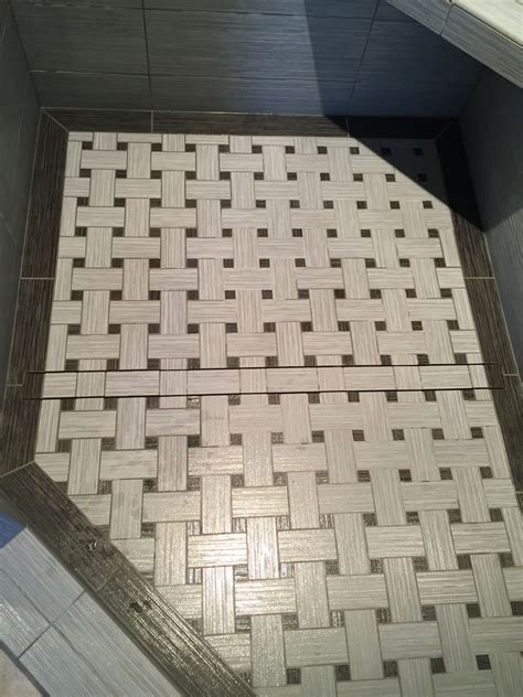 Weaving wood and tile into a stunning floor. Unique basket weave tile pattern incorporating the linear drain. | Basket weave tile, Custom ...