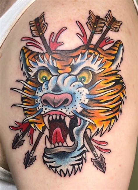 Cr Tiger With Arrows Hand Of Glory Tattoo
