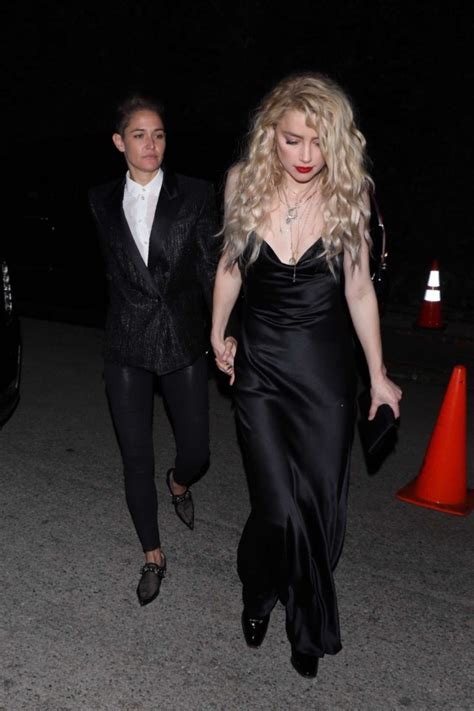 The hollywood actor is suing news group newspapers (ngn) and the sun's executive editor, dan wootton. Amber Heard is seen arriving with her new girlfriend at ...