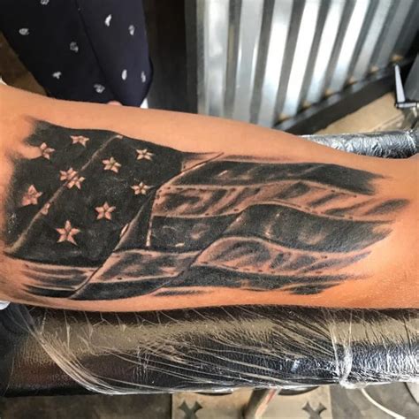 Flaming black and white checkered flag tattoo used in motor sport conceptual of the flames from the exhausts of the speeding bikes and cars, vector illustration. 85+ Best Patriotic American Flag Tattoos — I Love USA (2019)