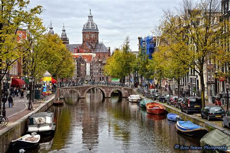 photos of the canals in amsterdam holland canals amsterdam travel around the world in 80 days