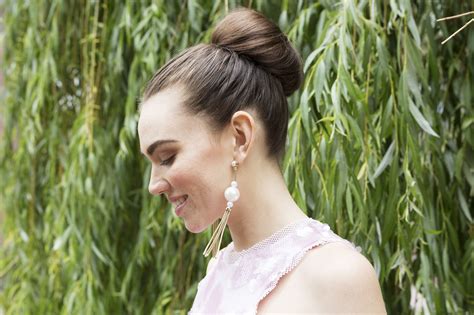 Part your hair into four equal sections, two on either side of the front and two on either side of the back. How To Use a Hair Donut To Make a Donut Bun | All Things ...