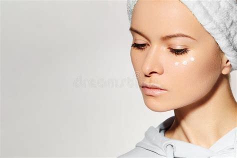 Woman Applying Beauty Skin Cream Wrinkle Cream Or Anti Aging Skin Care