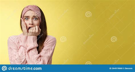 Shocked Frightened Stunned Cute Timid Girl Panicking Standing In Stupor Biting Fist In Fear