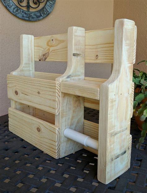 To add a little more style to your bathroom. Rustic Magazine Rack Toilet Paper Holder made from ...