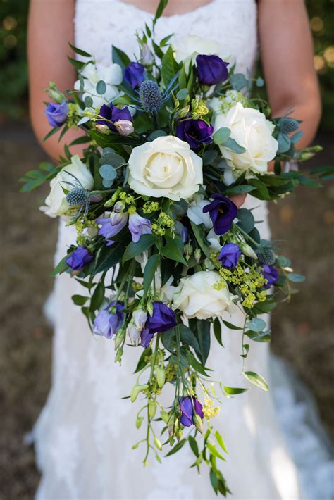 Teardrop Bouquet With White Roses Eucalyptus And Thistles Teardrop