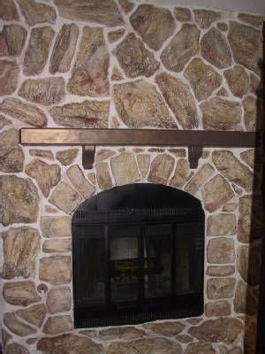 Frank added wood paneling to the entire wall of his brick fireplace for an incredible rustic. before and after rock fireplace makeover...rock white ...