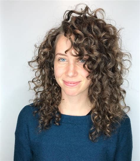 16 Cutest Curly Hair With Bangs To Try This Year