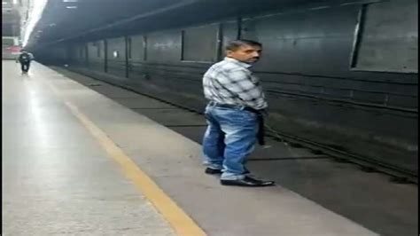 Video Of Man Urinating On Delhi Metro Tracks Goes Viral Delhi Metro