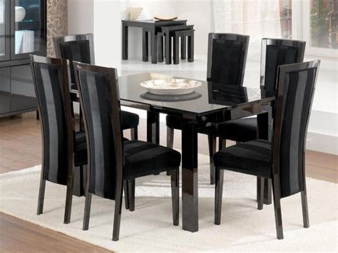 Use a black table in combination with green, red or yellow chairs for a striking contrast. Top 20 Black Glass Extending Dining Tables 6 Chairs ...