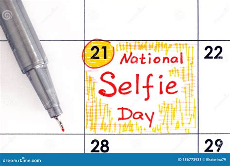 reminder national selfie day in calendar with pen stock image image of word writing 186773931
