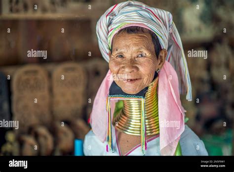 Portrait Of A Betel Chewing Long Neck Kayan Woman In Bagan Myanmar