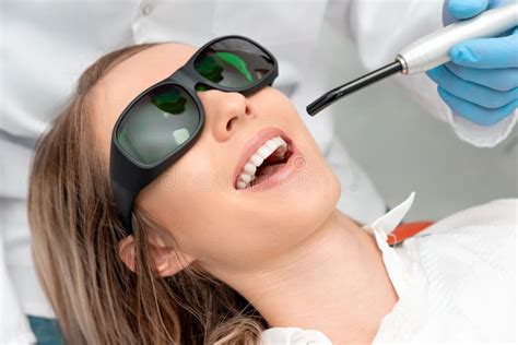 Using A Modern Method Of Laser Teeth Treatment Stock Photo Image Of