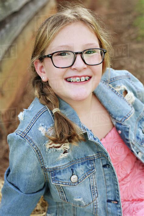 Girl With Braces And Glasses