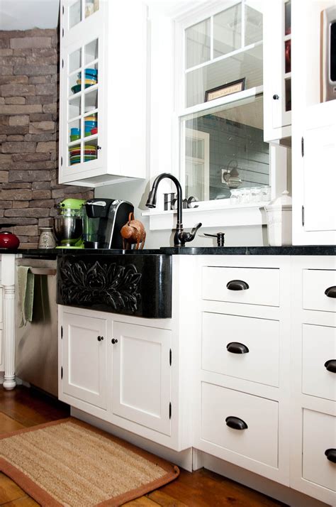 Simply scroll through your instagram feed, and you'll see a parade of if you have white cabinets, give them a little kick by swapping out your current pulls for more stylish ones. Maverick Custom Homes, black sink, white cabinets ...