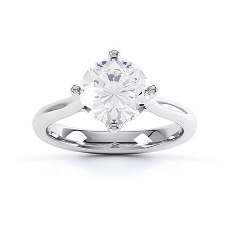 Low Compass Set 4 Claw Round Solitaire Ring