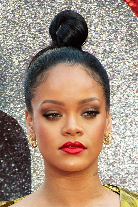 Rihanna Straight Dark Brown Bun Hairstyle Steal Her Style
