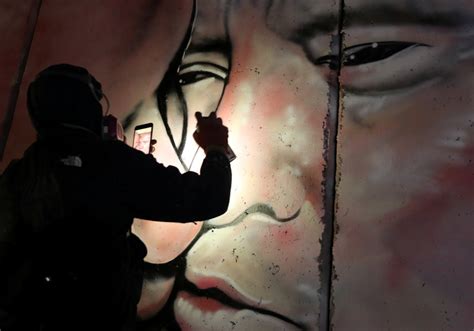 Watch West Bank Graffiti Depicts Netanyahu And Trump Locking Lips Israel News The Jerusalem