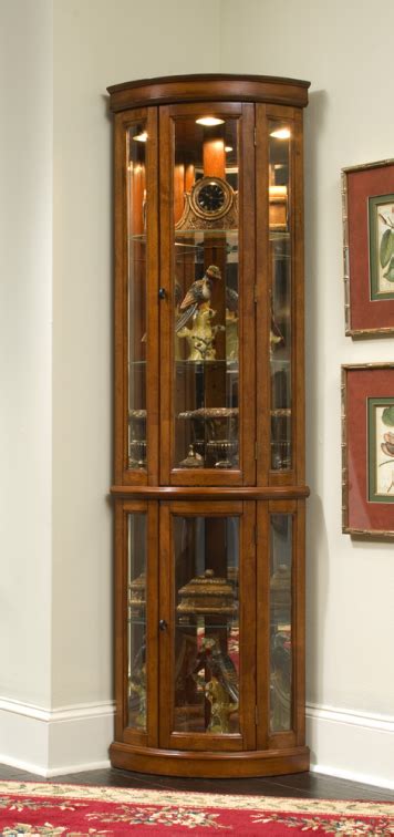 Bring a contemporary display cabinet to your home with this curio cabinet. Corner Curio Cabinet - Edwardian II | Pulaski | Home ...
