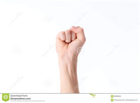 Woman`s Hand With A Clenched Fist Fingers Isolated On White Background
