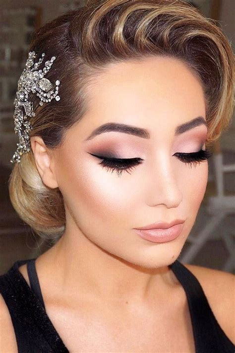 Beginning with a modern classic, this twisted low bun with tucked in pearls is polished without being too perfect. 45 Wedding Make Up Ideas For Stylish Brides | Amazing ...