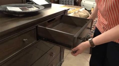 Grab the drawer on both sides near the back of the drawer, if you have a single stationary slide on the drawer sides. How to Remove a Drawer with Metal Glides - YouTube