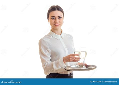 The Young Waitress Smiles And Keeps Wine Glasses Stock Photo Image Of