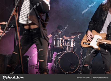 Rock Band On Stage — Stock Photo © Tarasmalyarevich 150799930