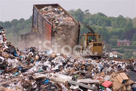 Landfill Garbage Waste Dumped In The Rubbish Dump Site Stock Photos