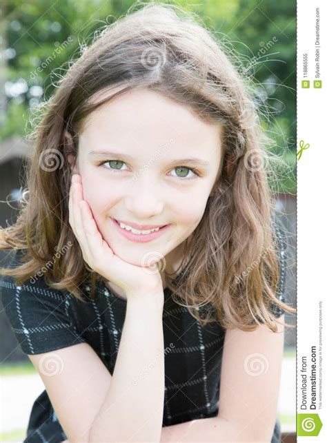 Face Portrait Of Child Girl Smiling Happy And Cute Stock